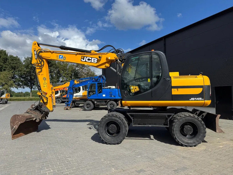 JCB 145W 2011 8770 UUR - Pelle sur pneus: photos 1 JCB 145W 2011 8770 UUR - Pelle sur pneus: photos 1
