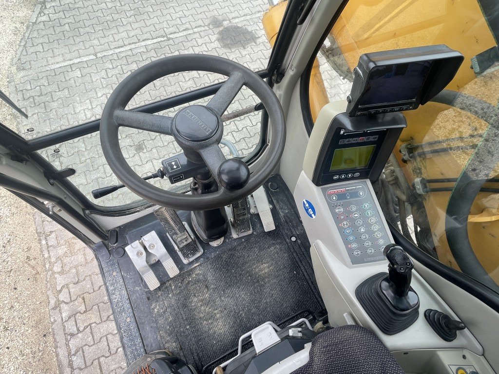 Pelle sur pneus Liebherr A 900 C Litronic: photos 11