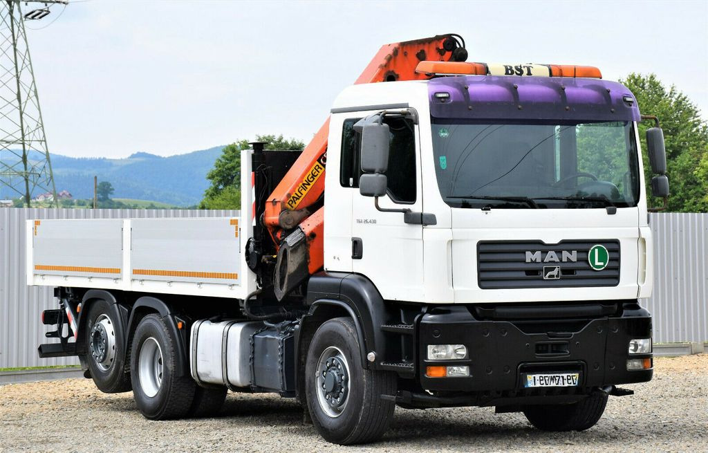 MAN TGA 26.430 Pritsche 5,50m + KRAN + FUNK/6-4H2 - Camion grue: photos 1 MAN TGA 26.430 Pritsche 5,50m + KRAN + FUNK/6-4H2 - Camion grue: photos 1
