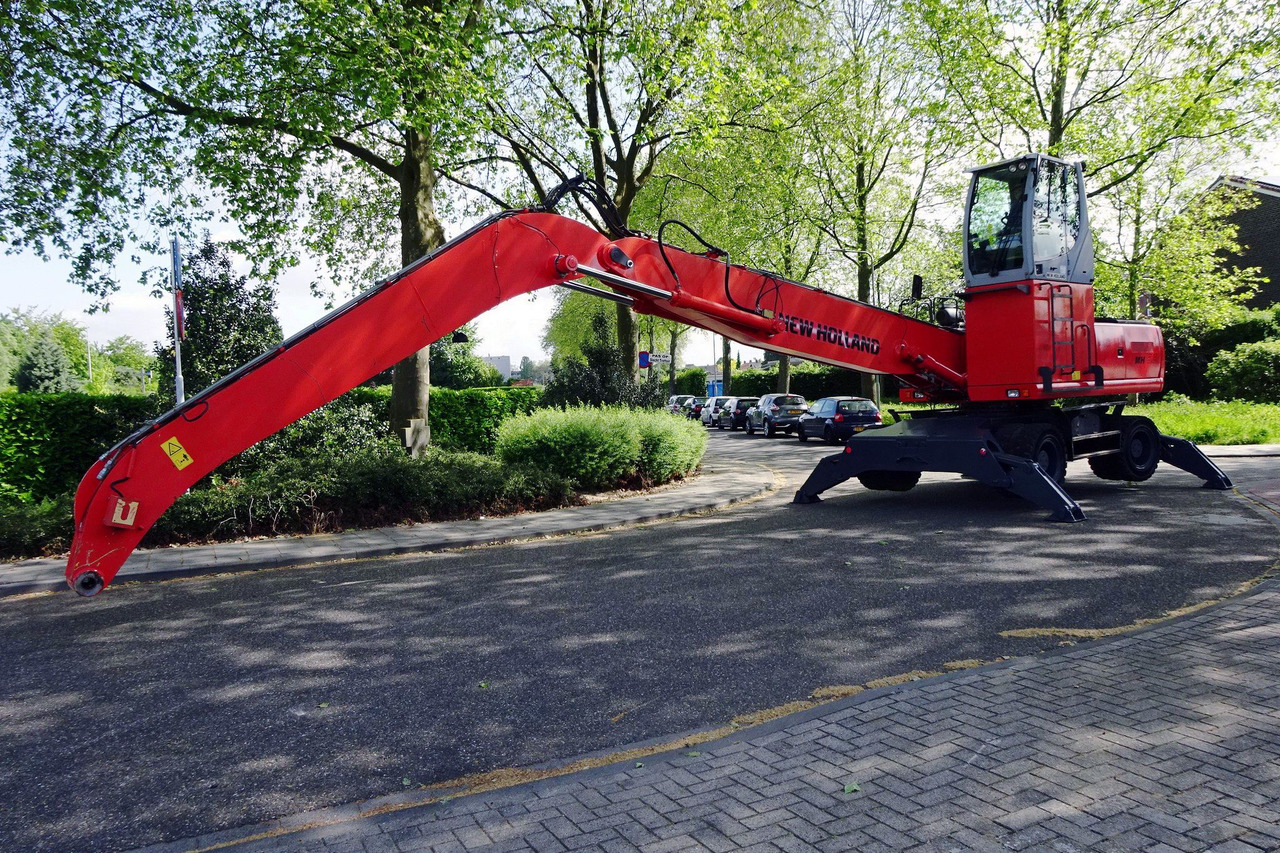 New Holland MH 6.6 Materialhandler With Magnet System - Pelle de manutention: photos 2 New Holland MH 6.6 Materialhandler With Magnet System - Pelle de manutention: photos 2