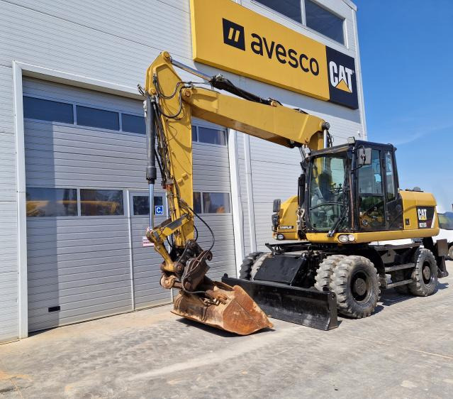 CATERPILLAR M315 - Pelle sur pneus: photos 1 CATERPILLAR M315 - Pelle sur pneus: photos 1