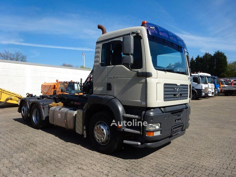 MAN TGA 26.310 6x4 Hook lift - Camion ampliroll: photos 1 MAN TGA 26.310 6x4 Hook lift - Camion ampliroll: photos 1