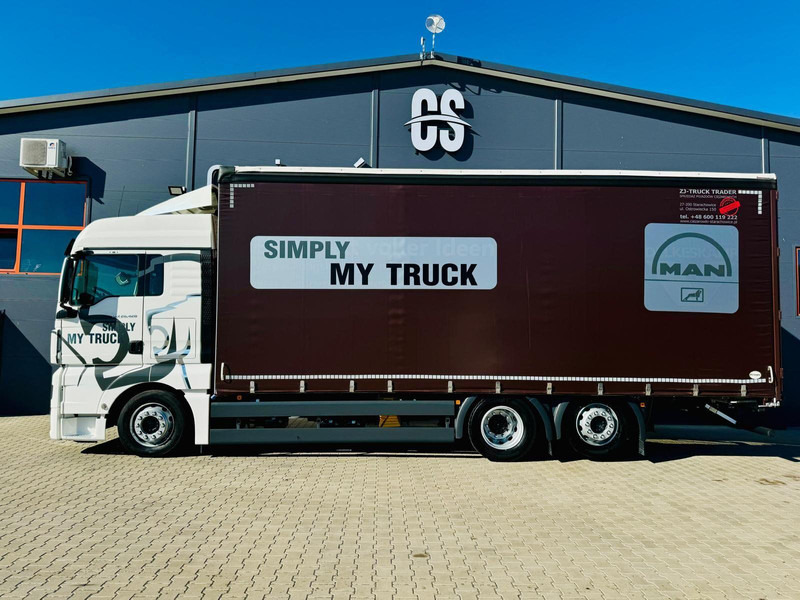 MAN TGX 26.420 - Camion à rideaux coulissants: photos 2 MAN TGX 26.420 - Camion à rideaux coulissants: photos 2