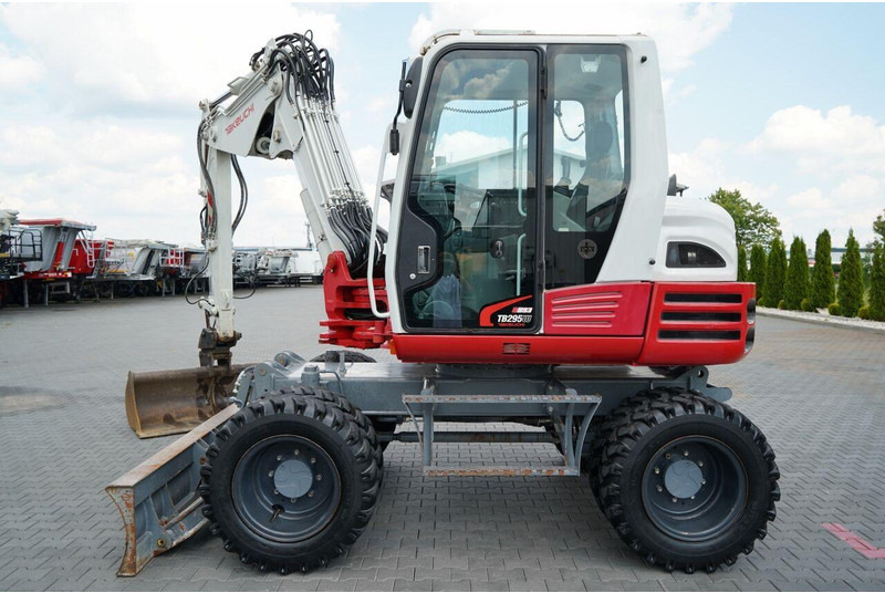 Takeuchi TB 295 W / KOPARKA KOŁOWA / 2016 ROK / PO KONTRAKCIE SERWISOWYM - Pelle sur pneus: photos 2 Takeuchi TB 295 W / KOPARKA KOŁOWA / 2016 ROK / PO KONTRAKCIE SERWISOWYM - Pelle sur pneus: photos 2
