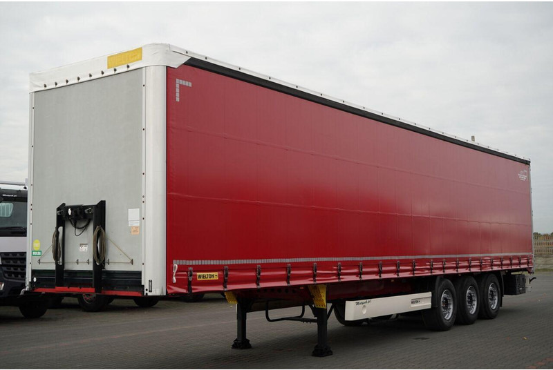 Wielton FIRANKA STANDARD / MULDA DO STALI - 9 M / OŚ PODNOSZONA / SAF - Semi-remorque rideaux coulissants: photos 1 Wielton FIRANKA STANDARD / MULDA DO STALI - 9 M / OŚ PODNOSZONA / SAF - Semi-remorque rideaux coulissants: photos 1