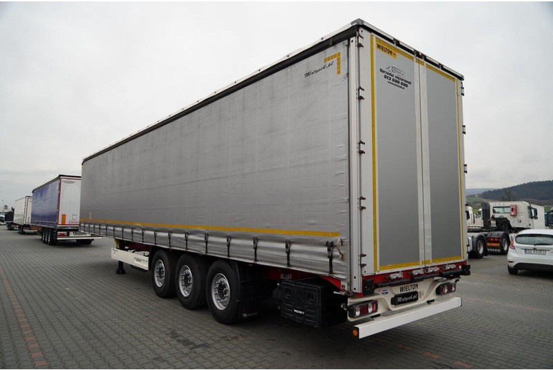 Wielton FIRANKA STANDARD / MULDA DO STALI - 9 M / OŚ PODNOSZONA / SAF / - Semi-remorque rideaux coulissants: photos 3 Wielton FIRANKA STANDARD / MULDA DO STALI - 9 M / OŚ PODNOSZONA / SAF / - Semi-remorque rideaux coulissants: photos 3