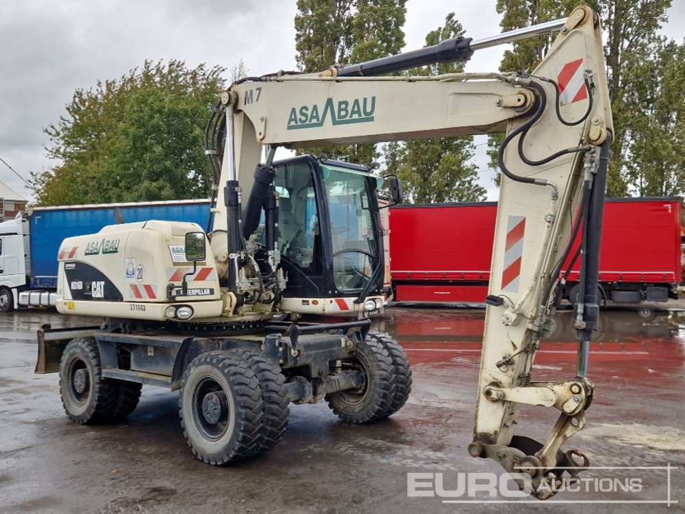 Pelle sur pneus 2011 CAT M316D: photos 7 Pelle sur pneus 2011 CAT M316D: photos 7