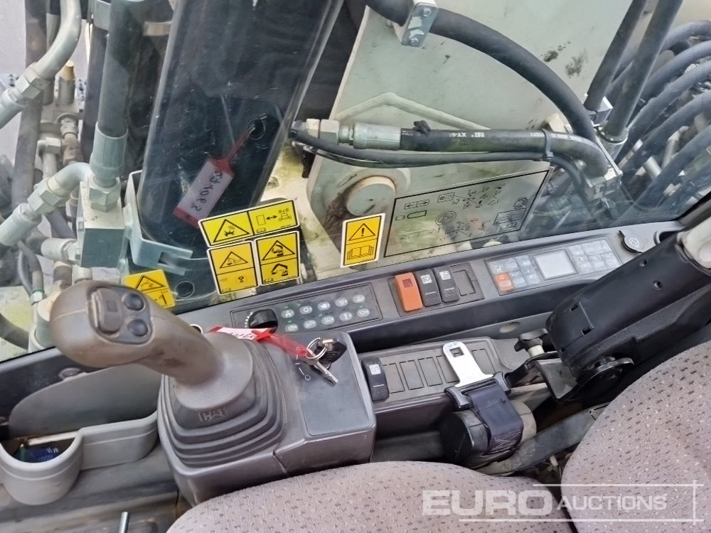 Pelle sur pneus 2011 CAT M316D: photos 37 Pelle sur pneus 2011 CAT M316D: photos 37