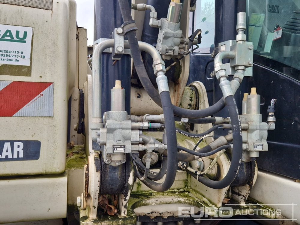 Pelle sur pneus 2011 CAT M316D: photos 26 Pelle sur pneus 2011 CAT M316D: photos 26