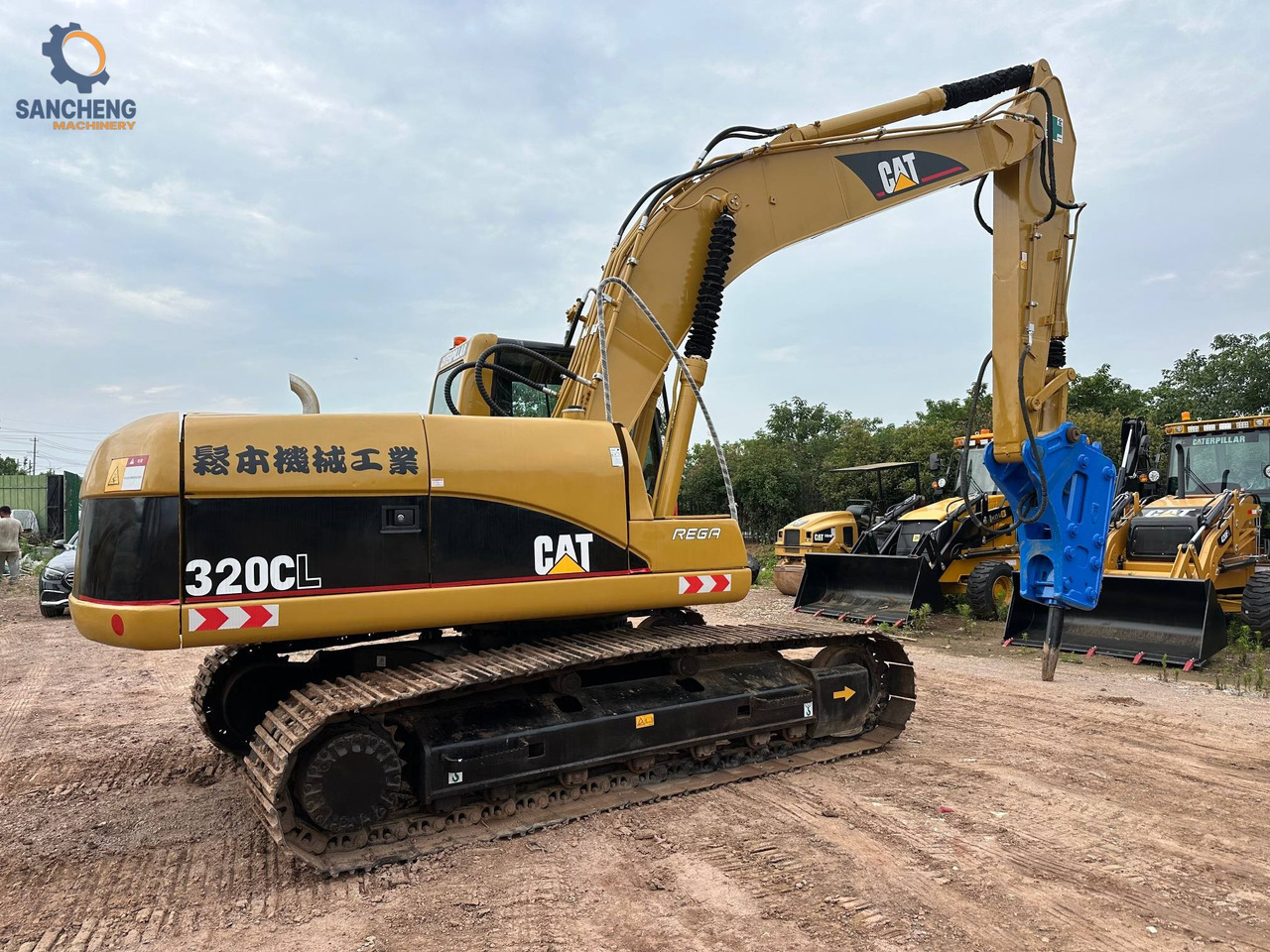 CAT 320CL with hammer - Pelle sur chenille: photos 3 CAT 320CL with hammer - Pelle sur chenille: photos 3