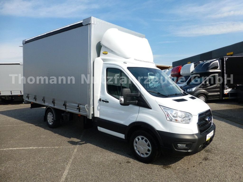Ford Transit Pritsche Plane 4,25m Klima Temp. DAB - Utilitaire rideaux coulissants (PLSC): photos 1 Ford Transit Pritsche Plane 4,25m Klima Temp. DAB - Utilitaire rideaux coulissants (PLSC): photos 1
