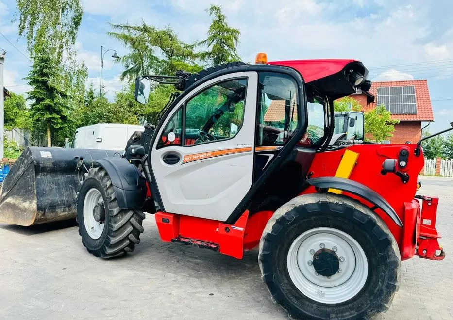 Manitou 741-140 V+ PREMIUM - Chariot télescopique: photos 1 Manitou 741-140 V+ PREMIUM - Chariot télescopique: photos 1