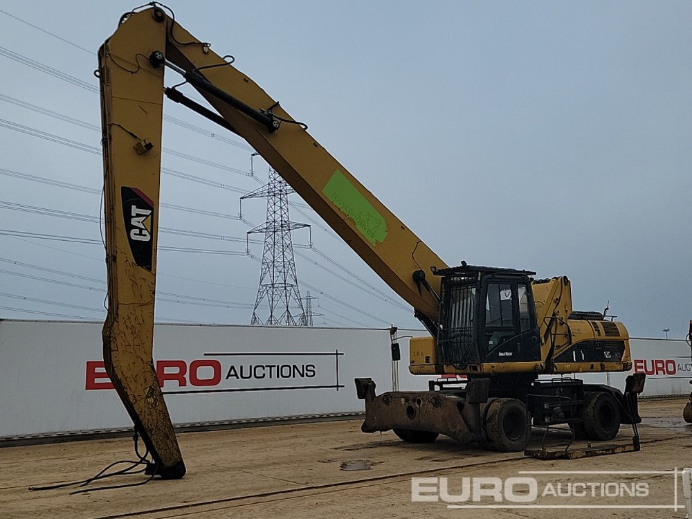 2013 CAT M325D - Pelle sur pneus: photos 1 2013 CAT M325D - Pelle sur pneus: photos 1