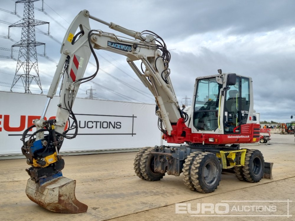 2021 Takeuchi TB295W - Pelle sur pneus: photos 1 2021 Takeuchi TB295W - Pelle sur pneus: photos 1