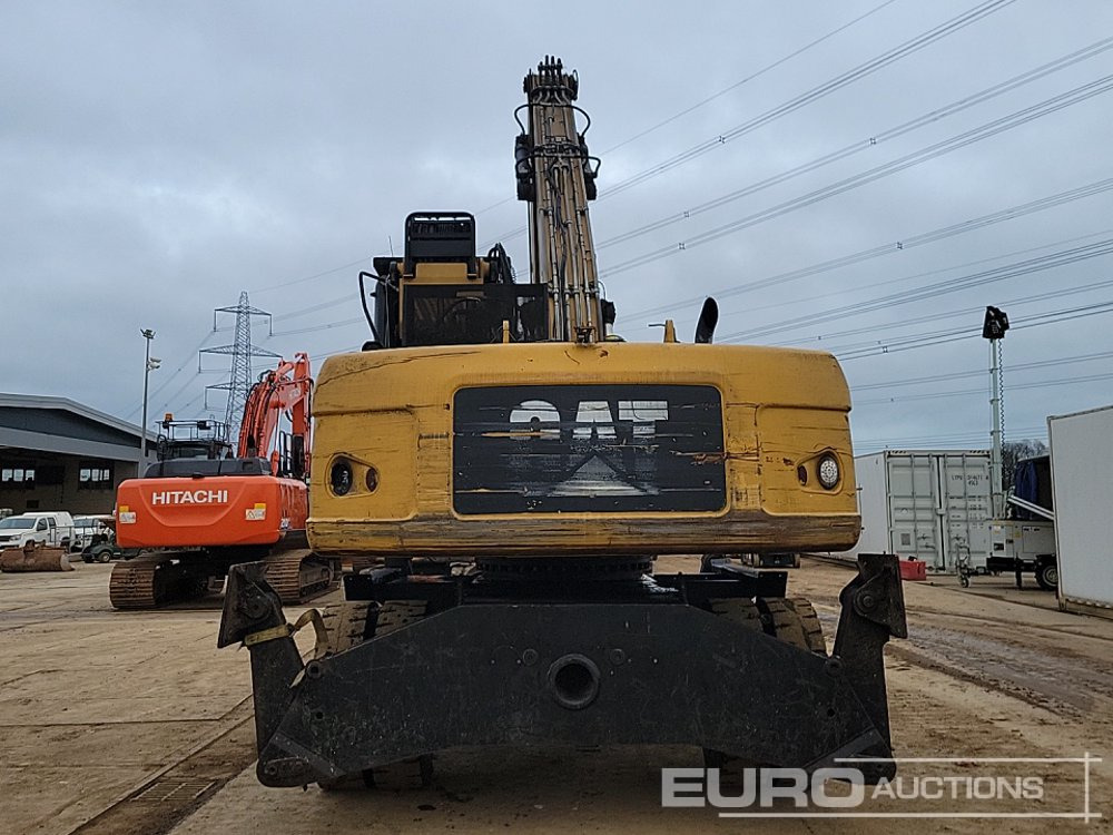 CAT M322D - Pelle sur pneus: photos 4 CAT M322D - Pelle sur pneus: photos 4