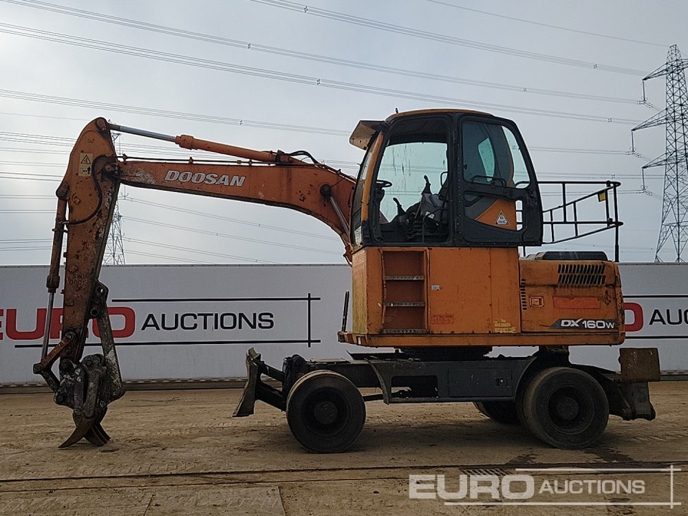 Doosan DX160W - Pelle sur pneus: photos 2 Doosan DX160W - Pelle sur pneus: photos 2