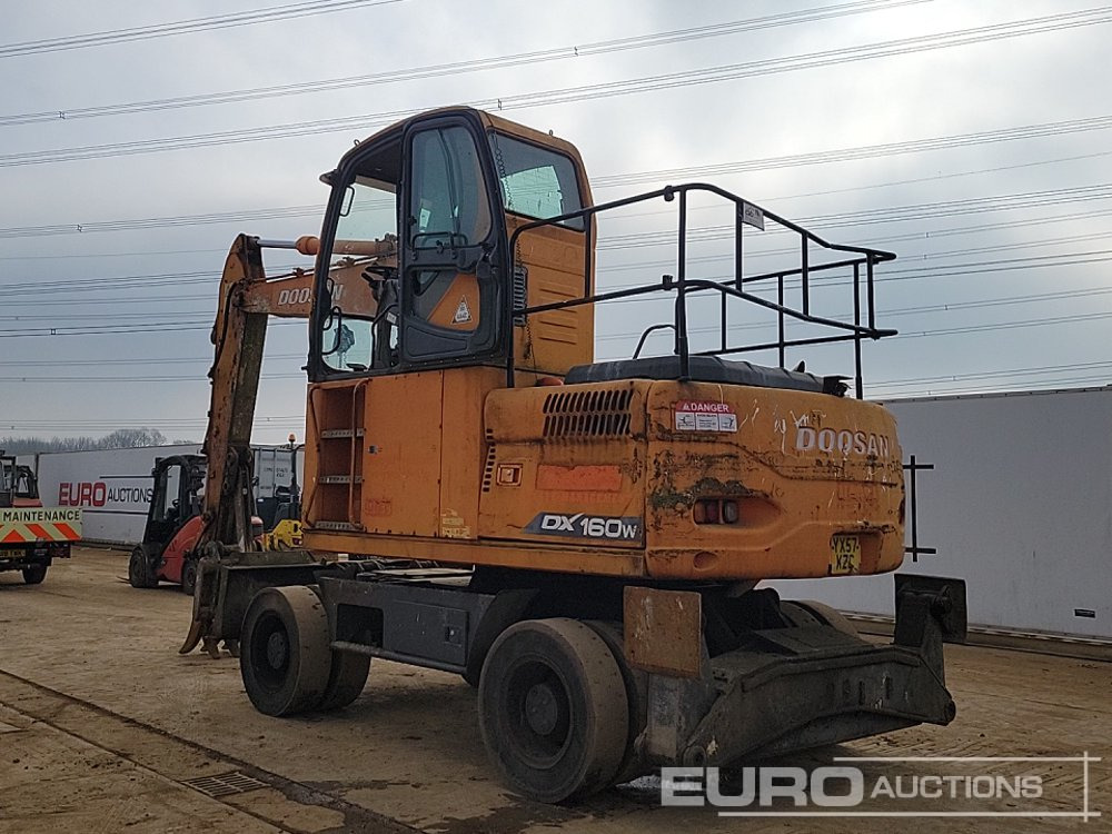 Doosan DX160W - Pelle sur pneus: photos 3 Doosan DX160W - Pelle sur pneus: photos 3