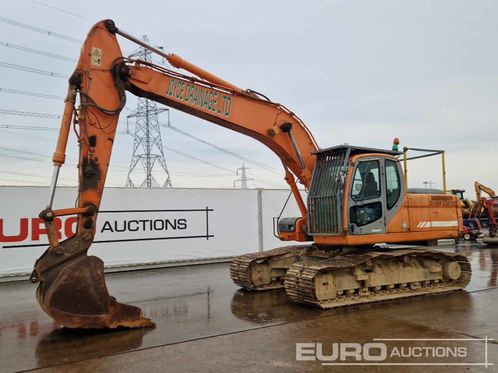 Doosan DX225LC - Pelle sur chenille: photos 1 Doosan DX225LC - Pelle sur chenille: photos 1