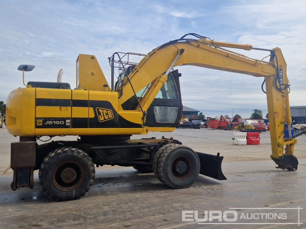 Pelle sur pneus JCB JS160W: photos 6 Pelle sur pneus JCB JS160W: photos 6