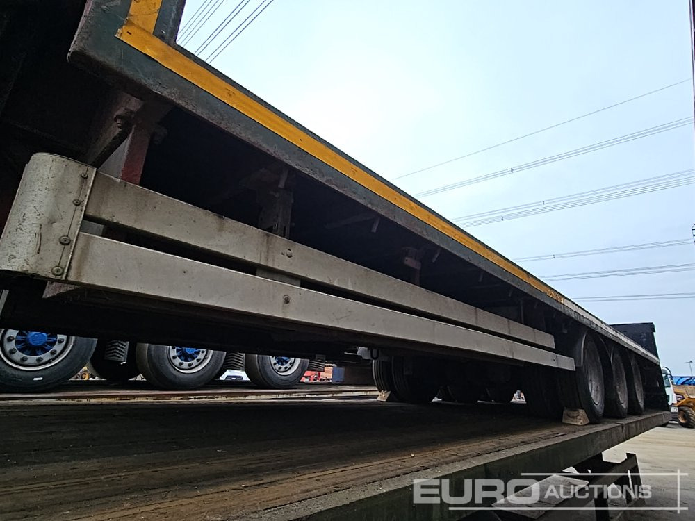 SDC Tri Axle Step Frame Flat Bed Trailer - Semi-remorque plateau: photos 3 SDC Tri Axle Step Frame Flat Bed Trailer - Semi-remorque plateau: photos 3