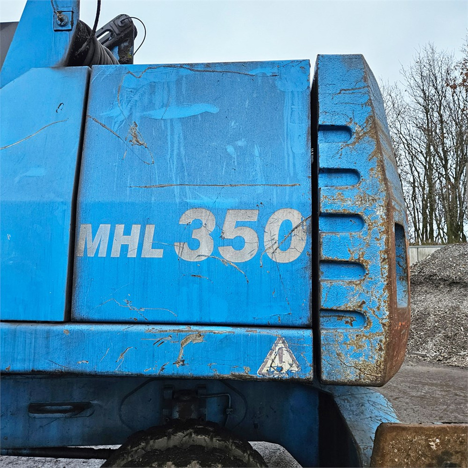 Pelle de manutention Fuchs MHL 350 D: photos 40
