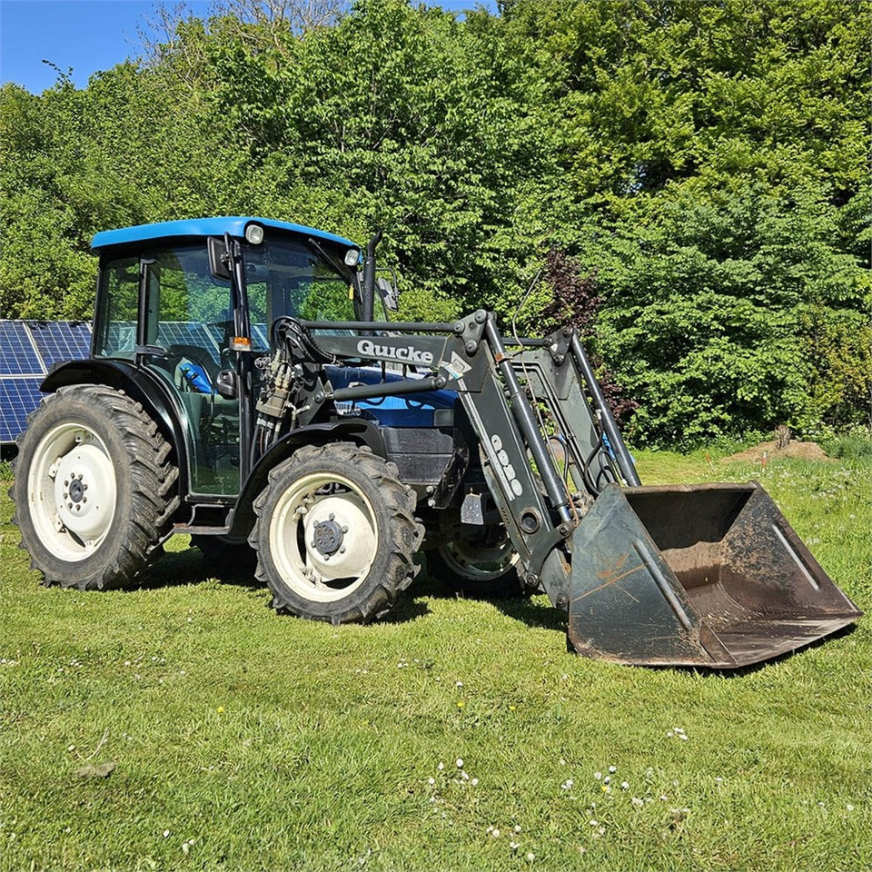 New Holland TN55D - Tracteur agricole: photos 1 New Holland TN55D - Tracteur agricole: photos 1