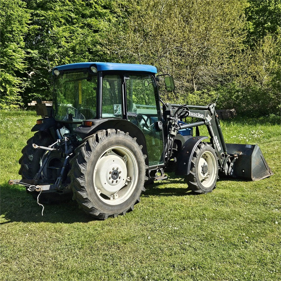 New Holland TN55D - Tracteur agricole: photos 3 New Holland TN55D - Tracteur agricole: photos 3