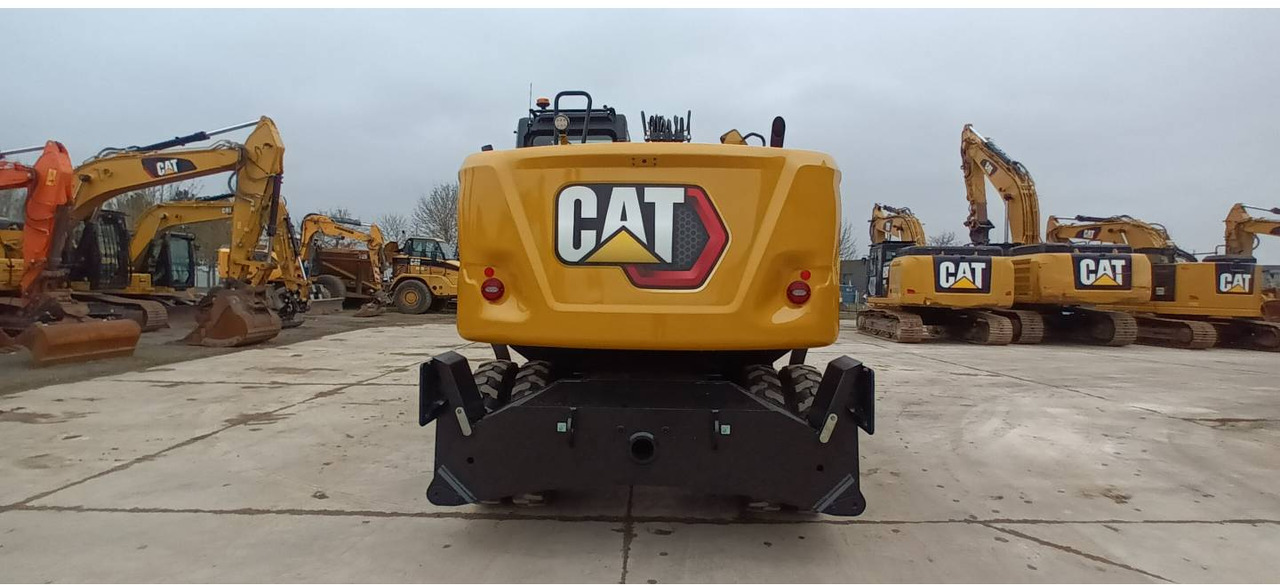 Pelle sur pneus CAT M314: photos 13