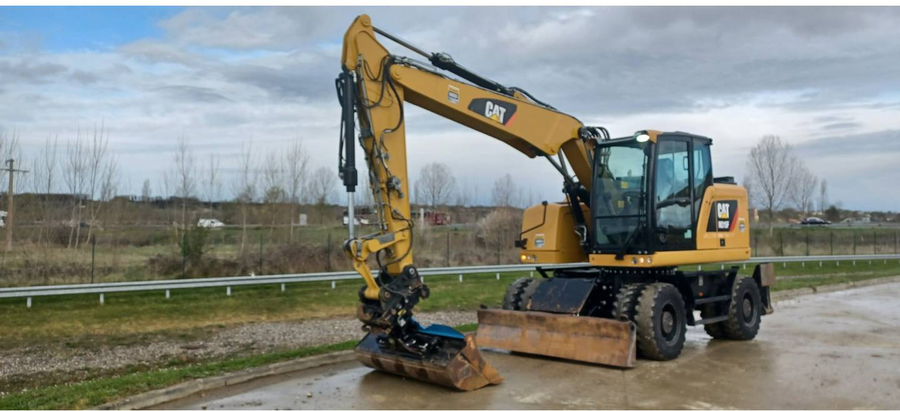 CAT M315F IVC - Pelle sur pneus: photos 1 CAT M315F IVC - Pelle sur pneus: photos 1