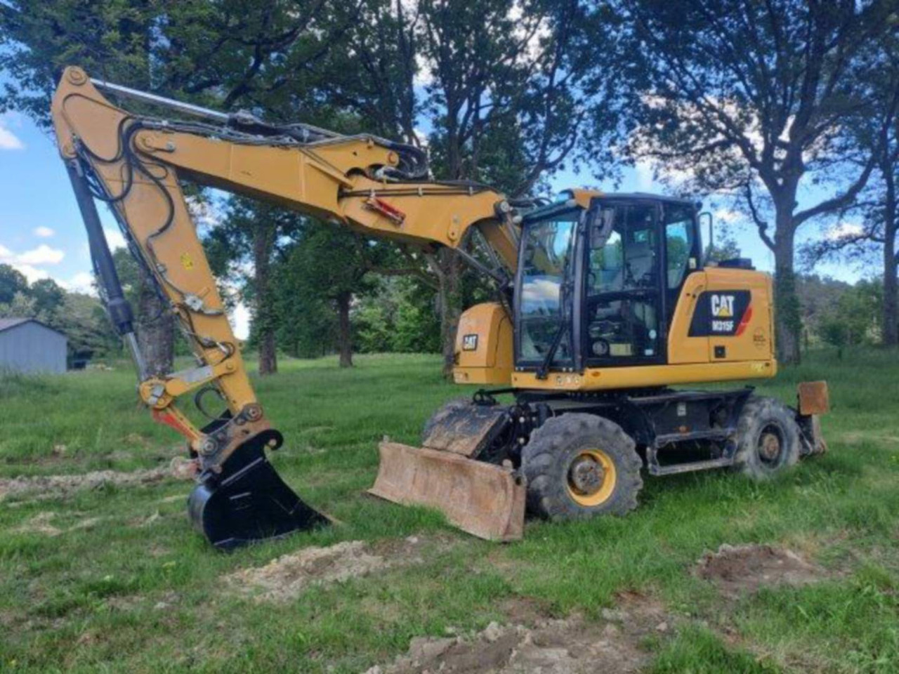 CAT M315F IVC - Pelle sur pneus: photos 1 CAT M315F IVC - Pelle sur pneus: photos 1