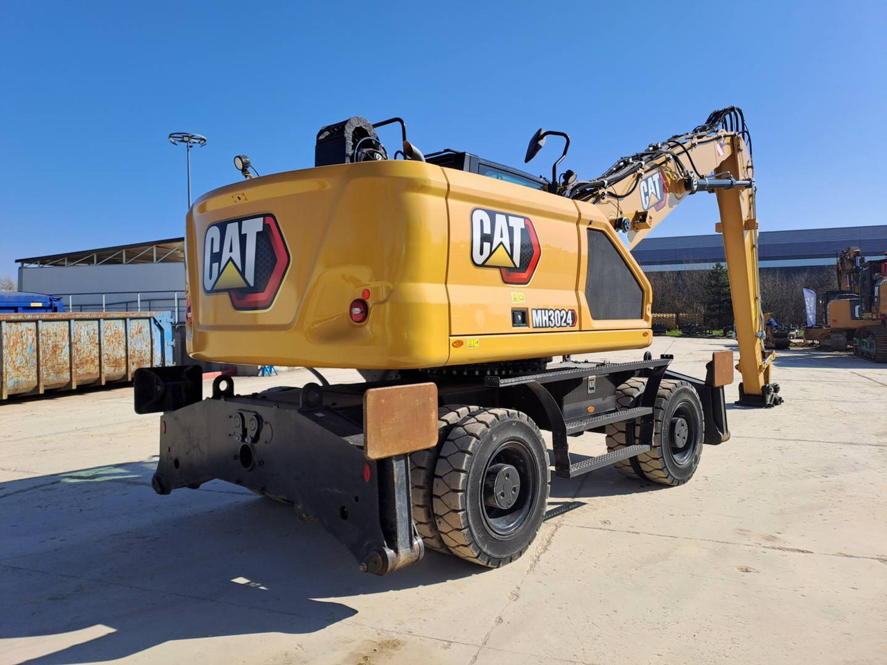 Pelle sur pneus CAT MH3024: photos 8