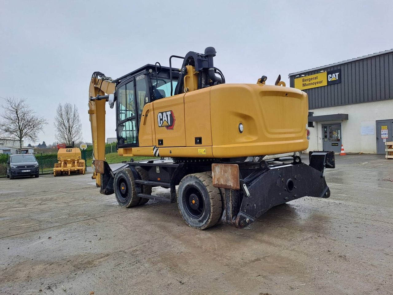 Pelle sur pneus CAT MH3024: photos 6