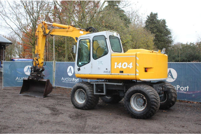 Atlas 1404 - Pelle sur pneus: photos 3 Atlas 1404 - Pelle sur pneus: photos 3