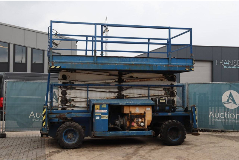 Holland lift COMBISTAR B-195DL25-4WD/P/N - Nacelle ciseaux: photos 1 Holland lift COMBISTAR B-195DL25-4WD/P/N - Nacelle ciseaux: photos 1