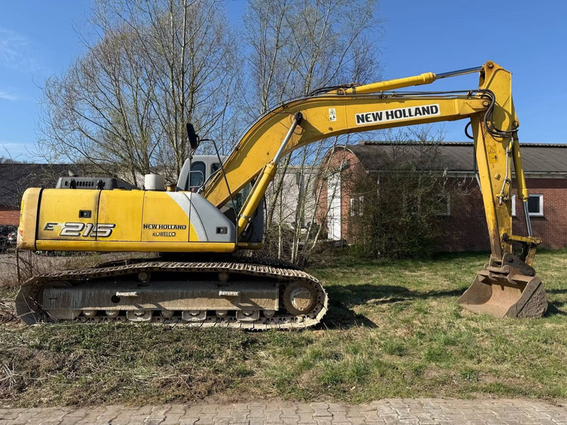 New Holland E215 - Pelle sur chenille: photos 1 New Holland E215 - Pelle sur chenille: photos 1