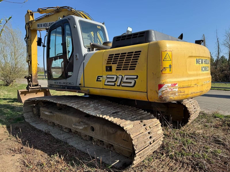 New Holland E215 - Pelle sur chenille: photos 2 New Holland E215 - Pelle sur chenille: photos 2