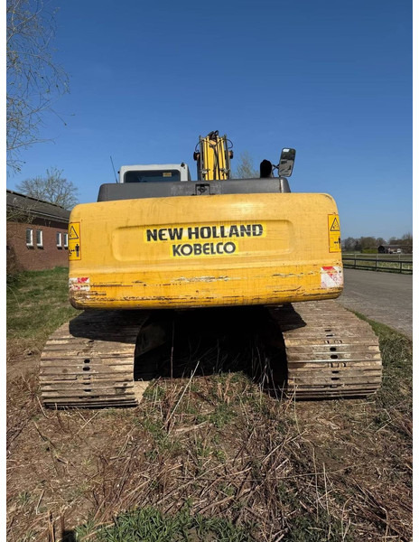 New Holland E215 - Pelle sur chenille: photos 3 New Holland E215 - Pelle sur chenille: photos 3