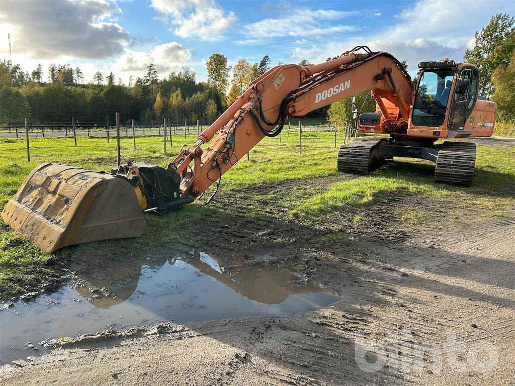 Doosan DX225LC (Låga timmar) - Pelle sur chenille: photos 1 Doosan DX225LC (Låga timmar) - Pelle sur chenille: photos 1