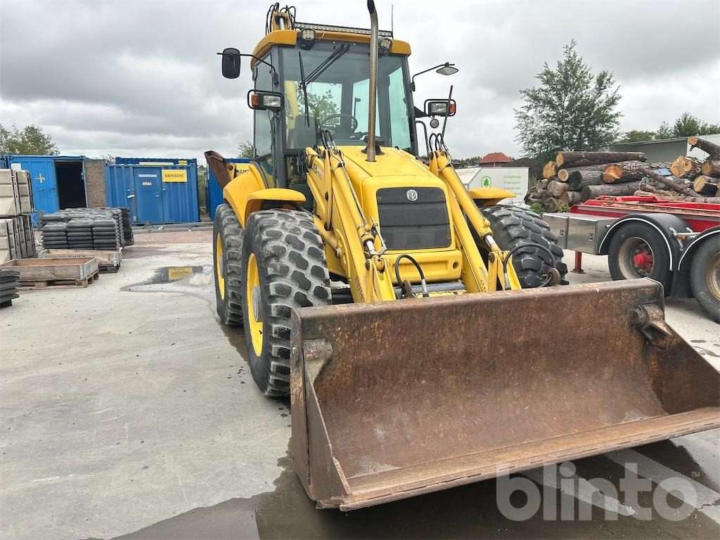 New Holland LB115 4WD - Tractopelle: photos 3 New Holland LB115 4WD - Tractopelle: photos 3